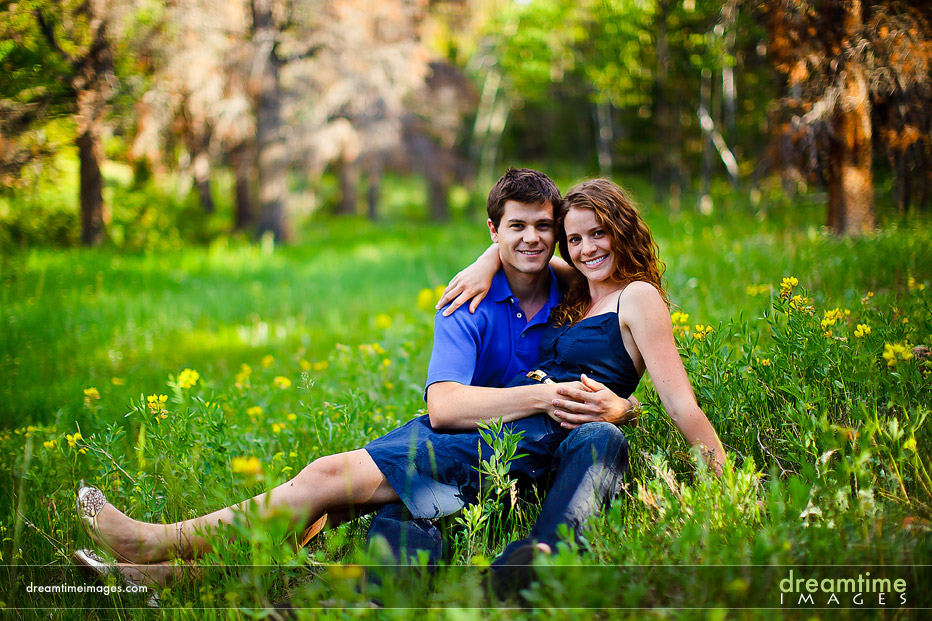 engaged couple at lilly lake estes park