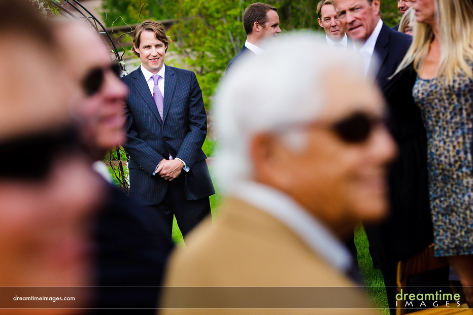 groom watches bride vail colorado
