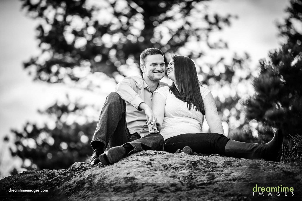 Couple in front of tree
